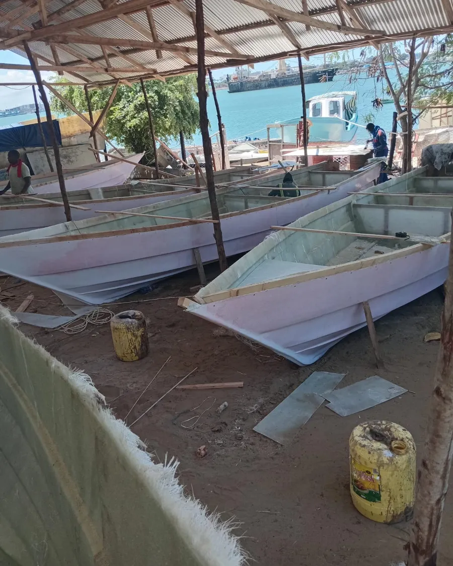 Fibreglass boats under construction in the boatyard